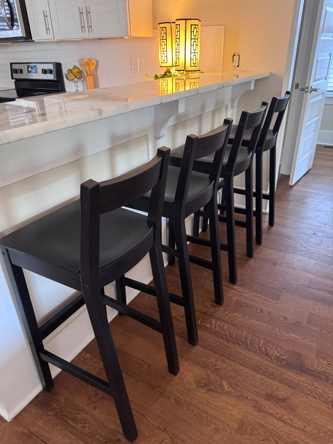 Four Black Bar Height Stools (not vintage)